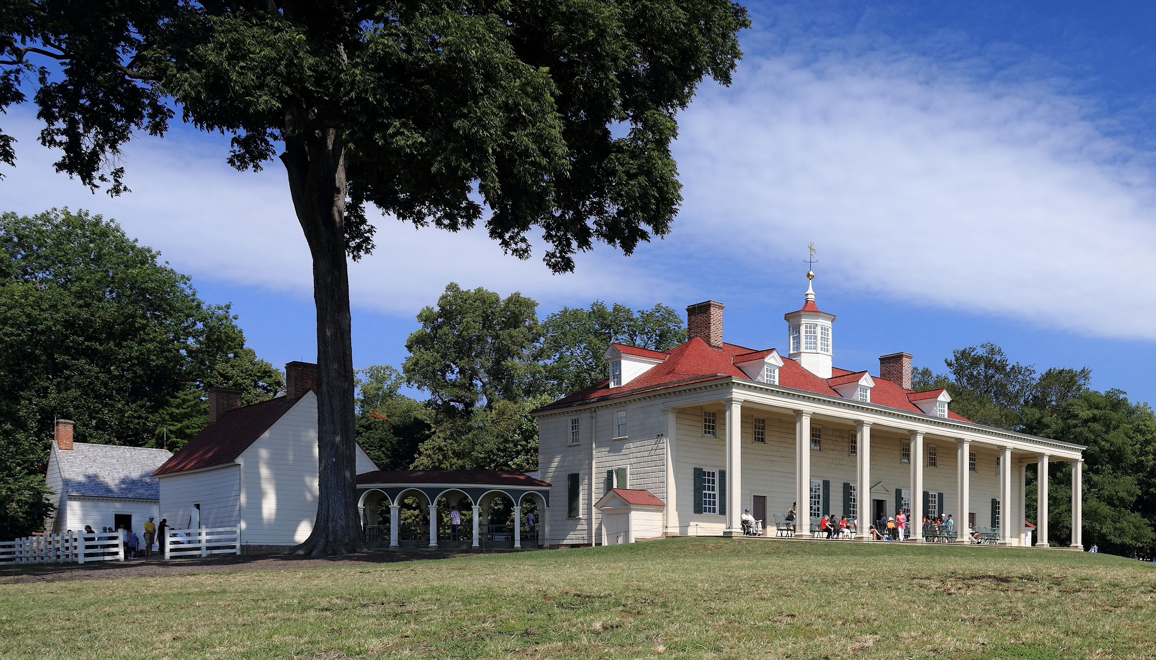 The east front of George Washington's Mount Vernon mansion, its long two-story piazza overlooking the Potomac River.