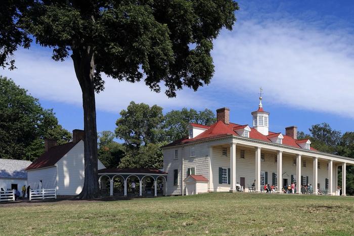 The east front of George Washington's Mount Vernon mansion, its long two-story piazza overlooking the Potomac River.