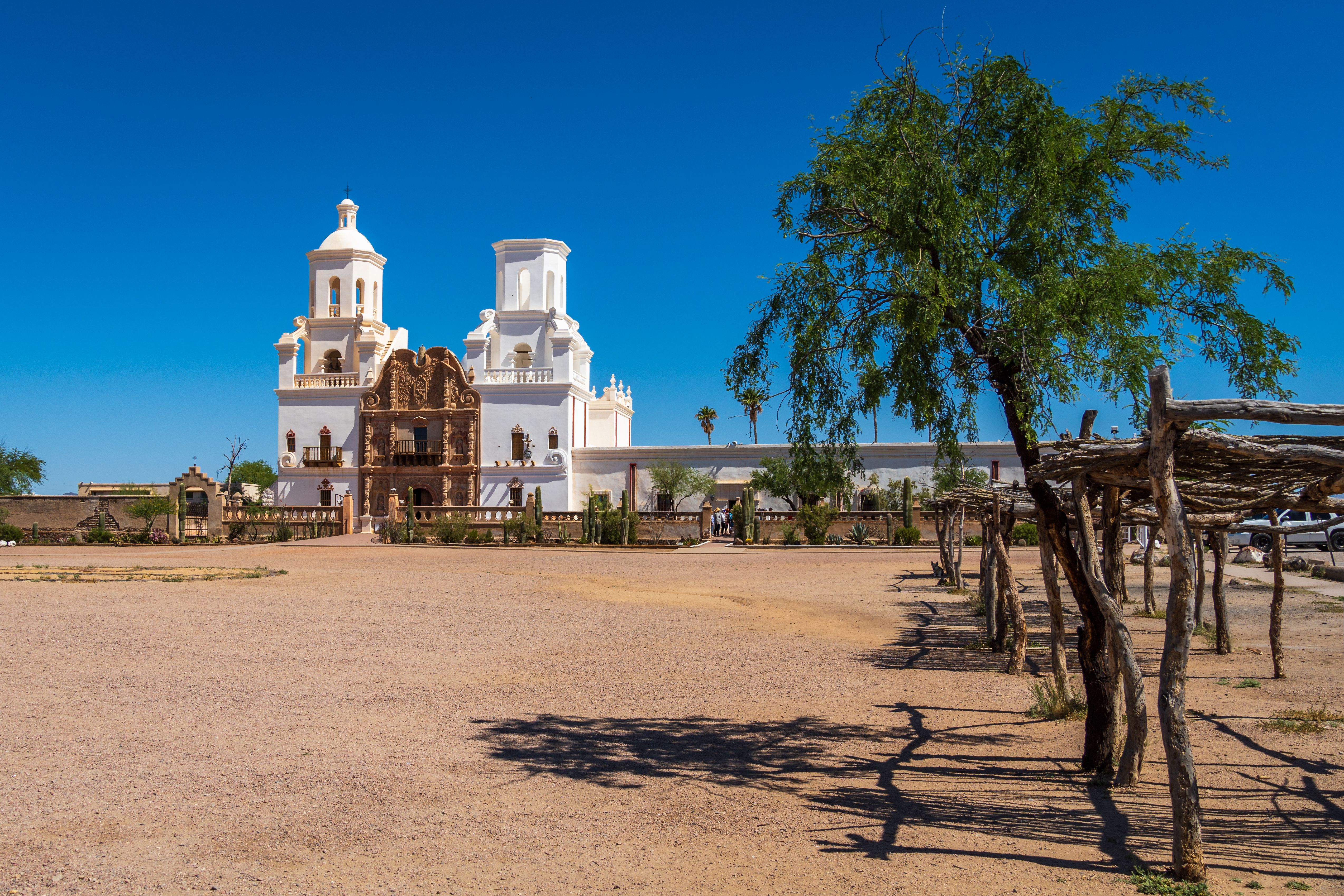 The white Baroque facade of Mission San Xavier del Bac near Tucson.