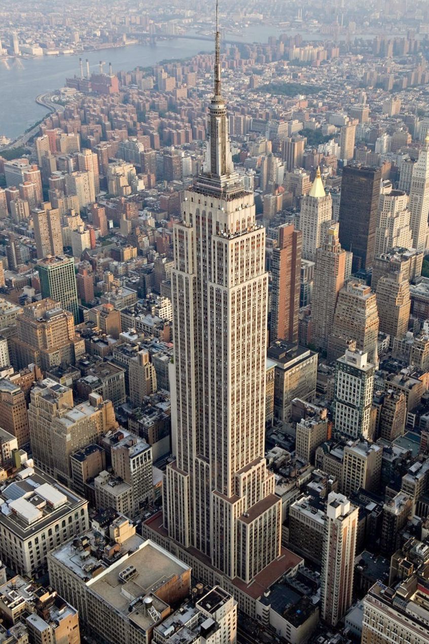 An aerial view of the Empire State Building and Manhattan.