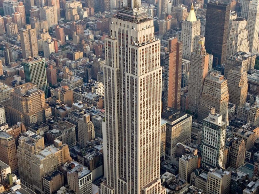An aerial view of the Empire State Building and Manhattan.