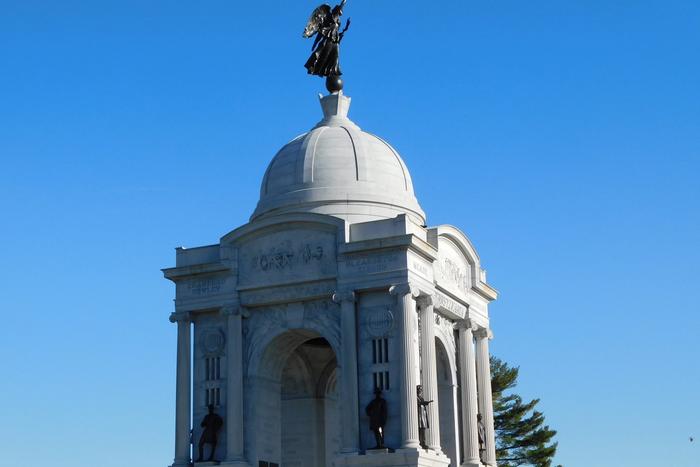 The domed Pennsylvania State Memorial rising above the open fields of Gettysburg National Military Park.