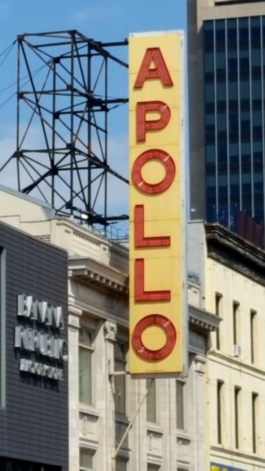 The iconic vertical Apollo Theater sign in Harlem.