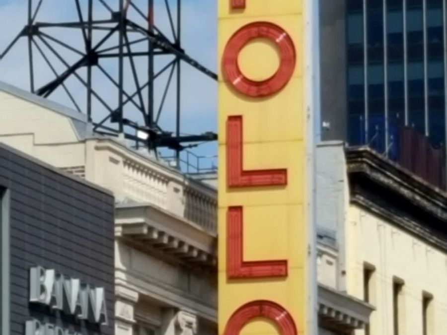 The iconic vertical Apollo Theater sign in Harlem.