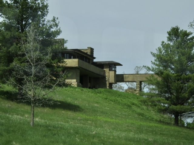 An exterior view of Taliesin, Frank Lloyd Wright's Wisconsin home built into the hillside.