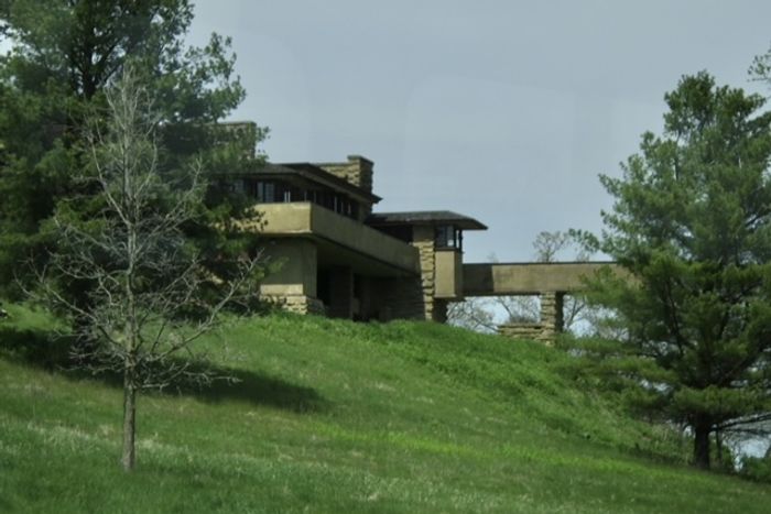 An exterior view of Taliesin, Frank Lloyd Wright's Wisconsin home built into the hillside.