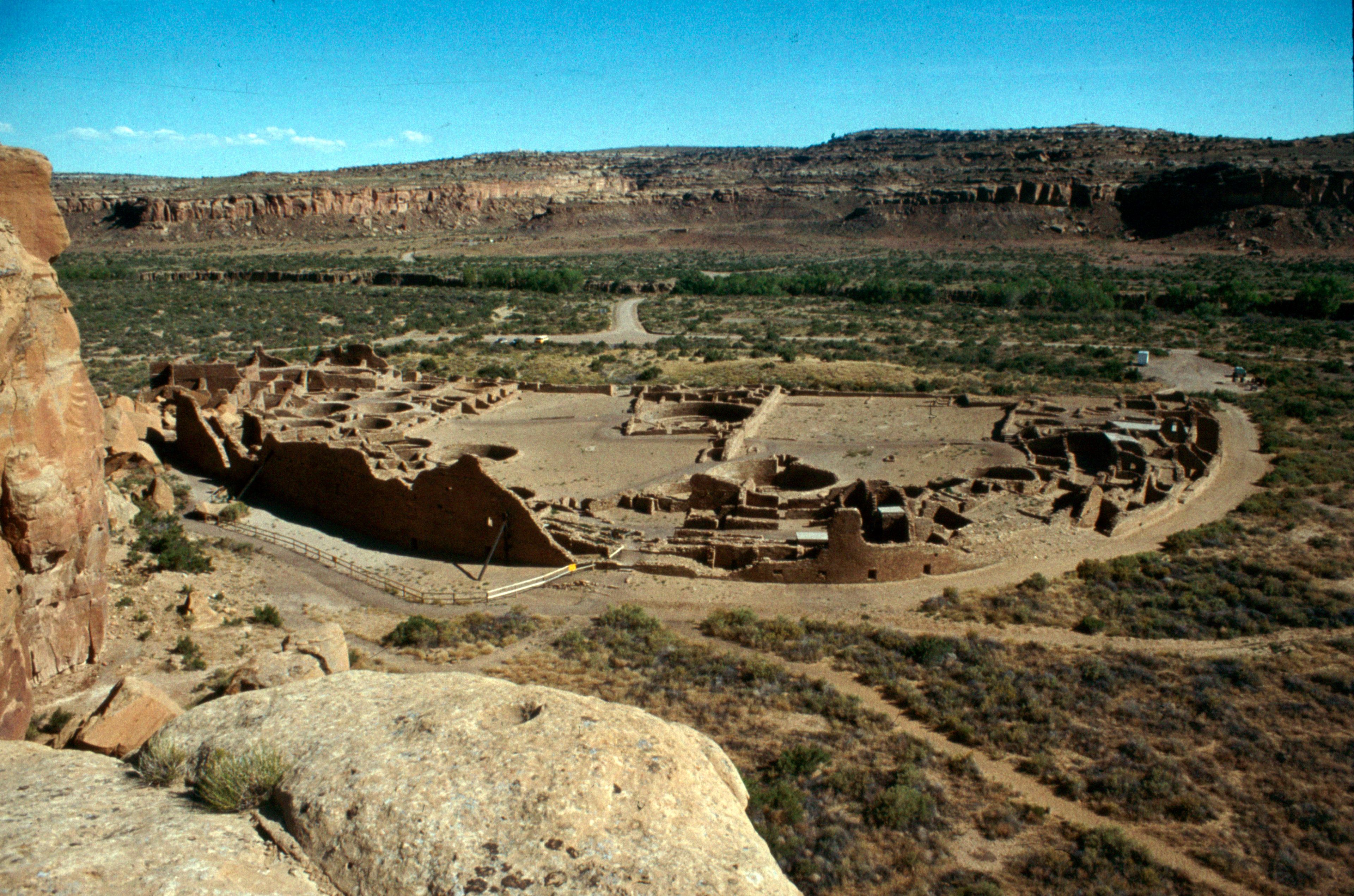An aerial view showing the D-shaped plan of Pueblo Bonito.