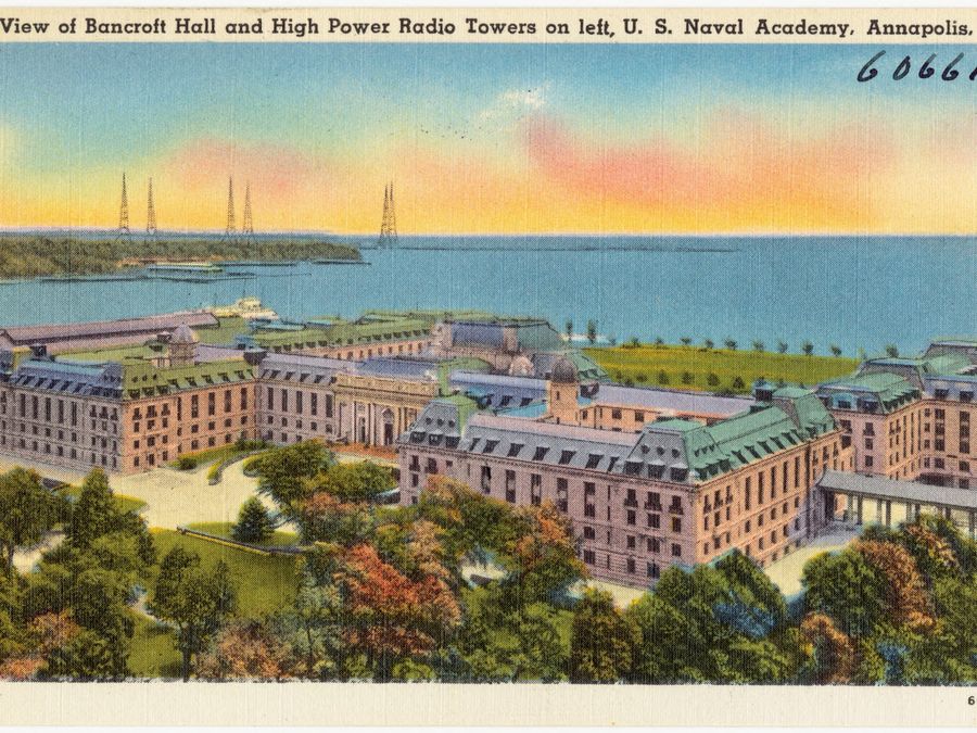 A historic aerial photograph of Bancroft Hall at the Naval Academy.
