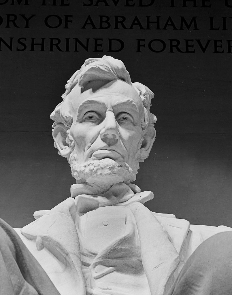 The statue of Abraham Lincoln inside the Lincoln Memorial.