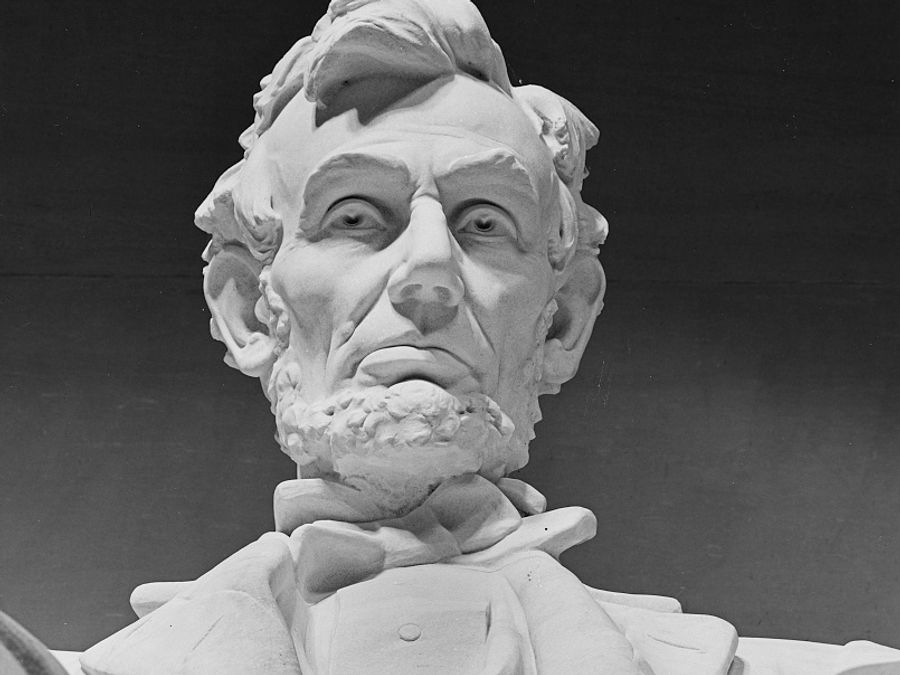 The statue of Abraham Lincoln inside the Lincoln Memorial.