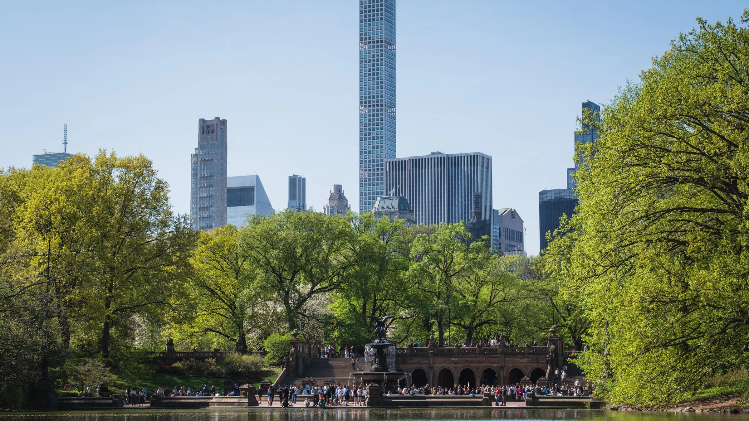 Bethesda Terrace and the lake in Central Park, with the Manhattan skyline behind.