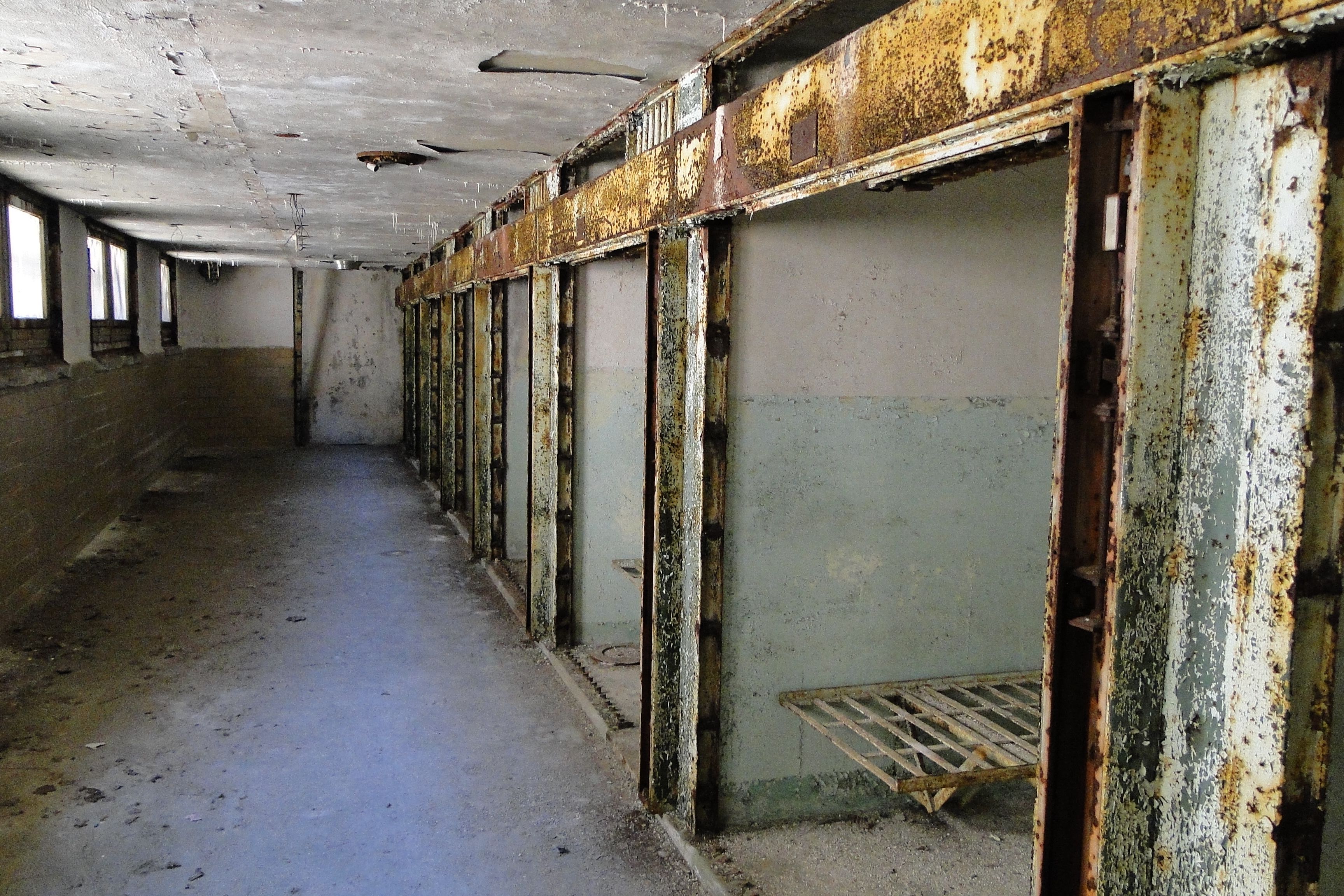 A decaying cellblock corridor inside Eastern State Penitentiary.