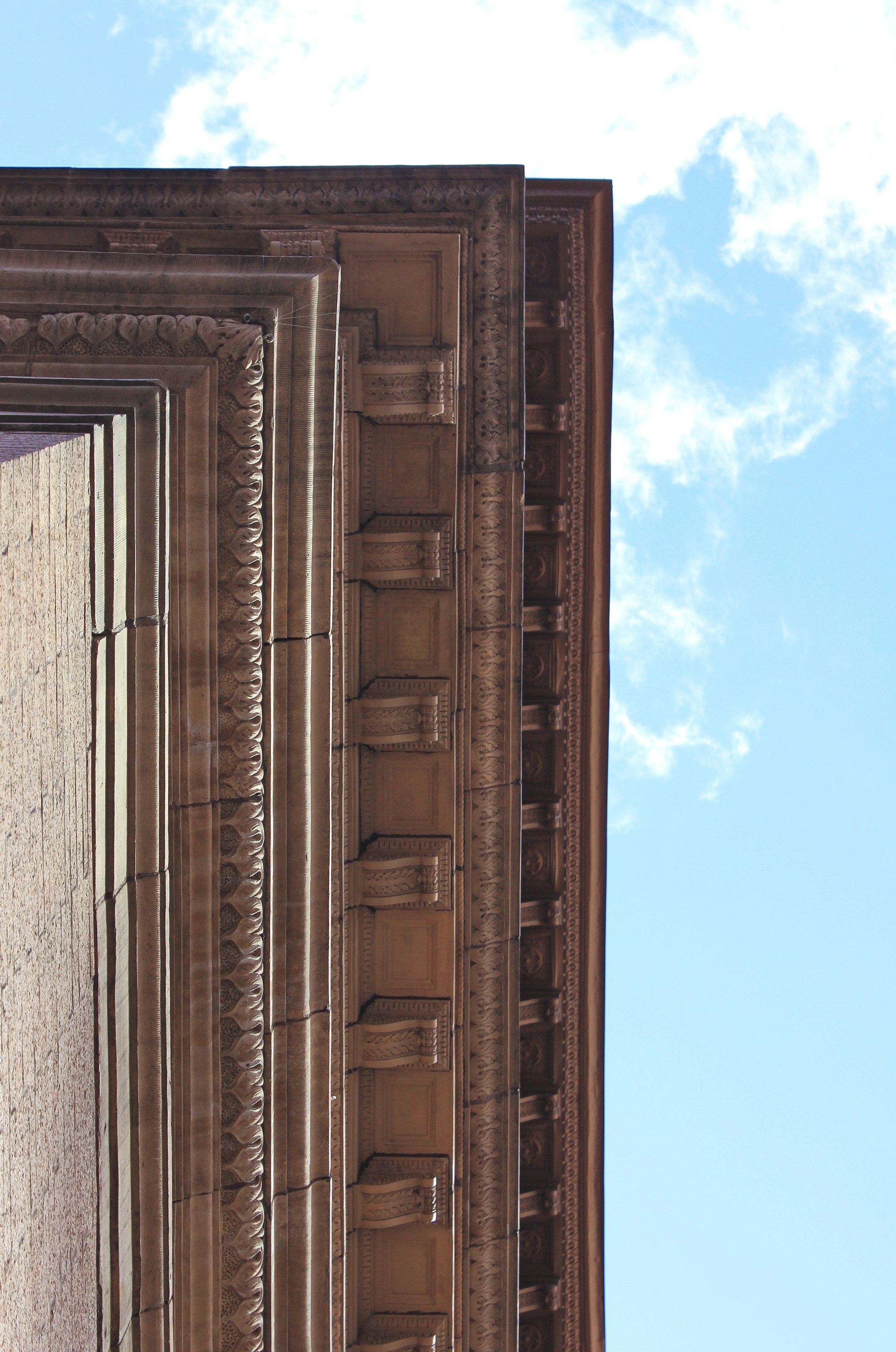 A detail of the ornate cornice on Carnegie Hall's Italian Renaissance facade.