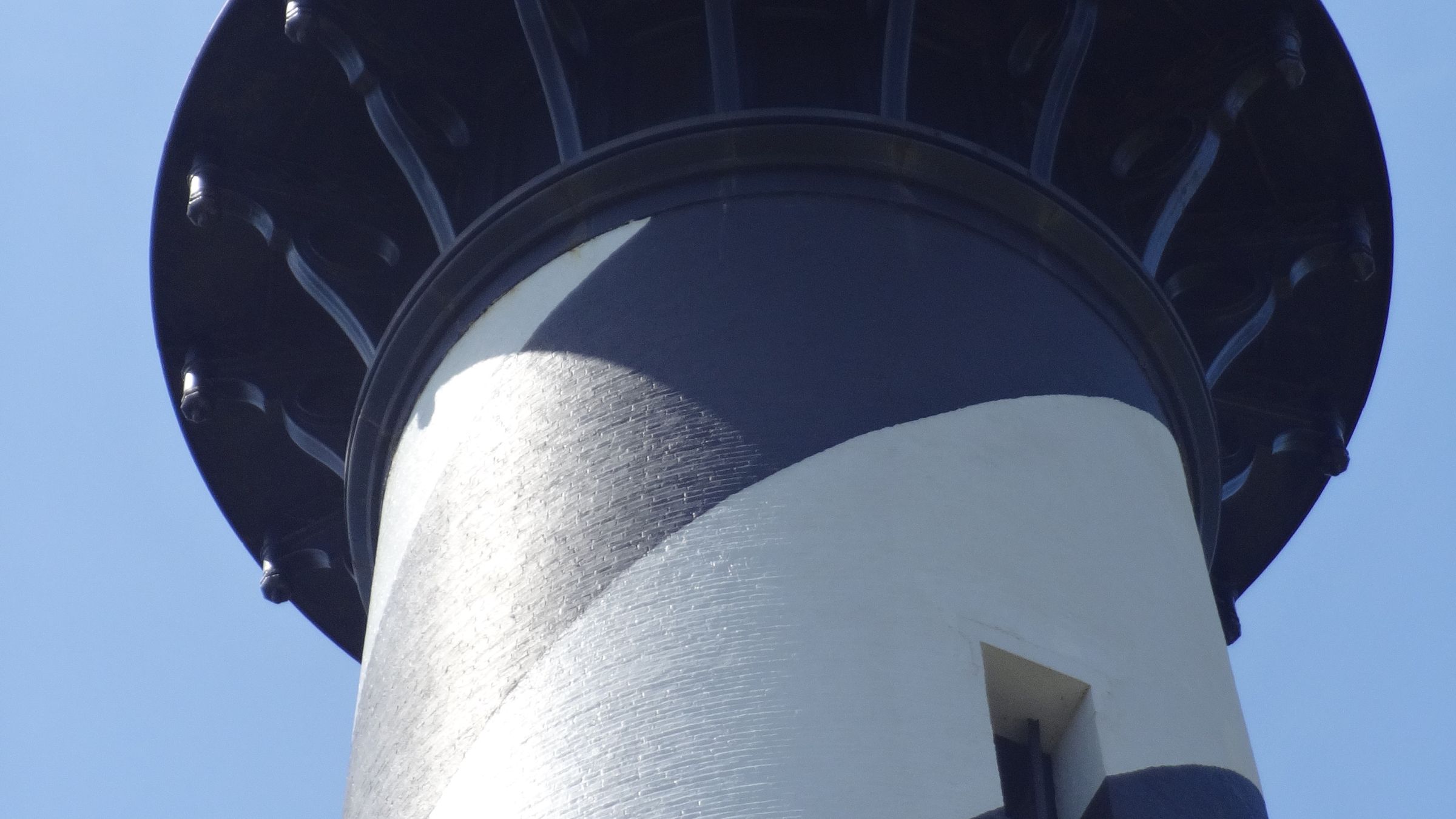 The black-and-white spiral tower of Cape Hatteras Lighthouse.