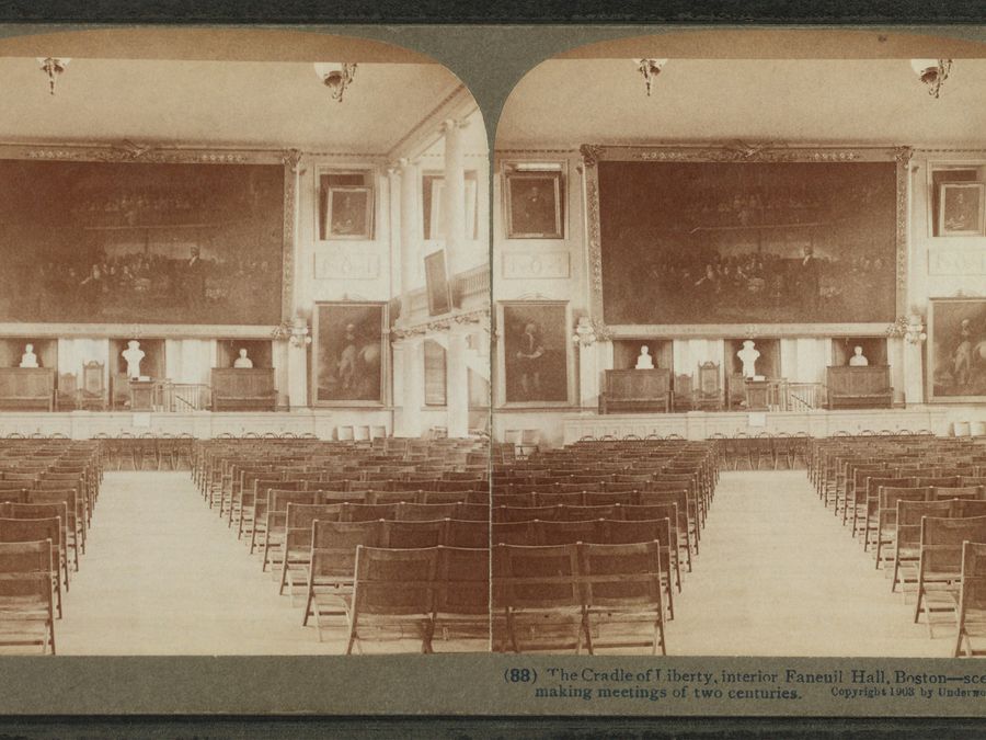 An early photograph of the interior meeting hall of Faneuil Hall.