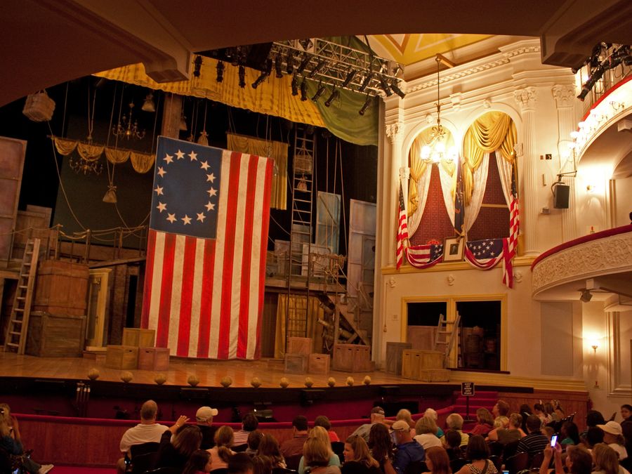 The interior of Ford's Theatre showing the stage and the presidential box.