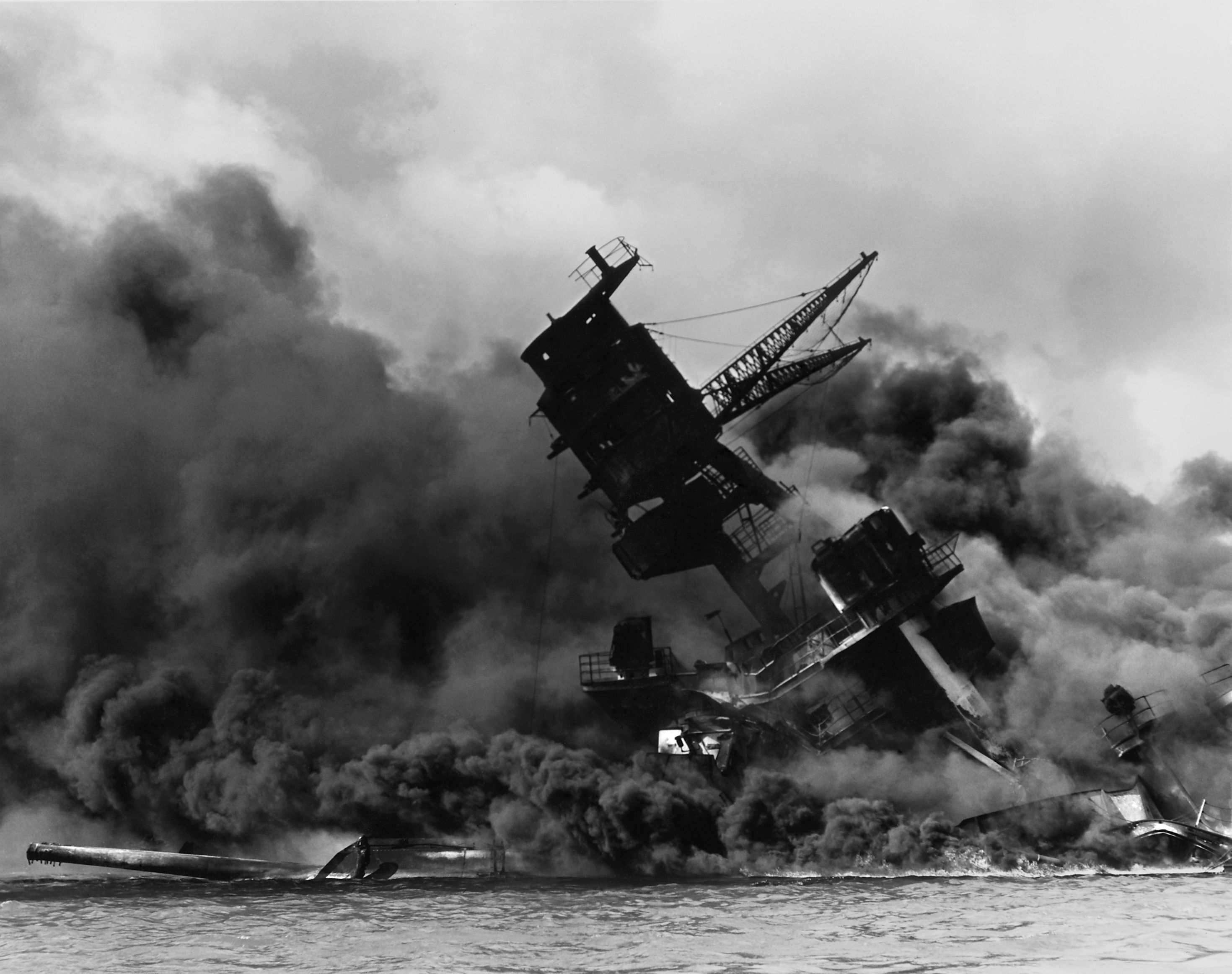 The USS Arizona burning after the Japanese attack on Pearl Harbor, December 7, 1941.
