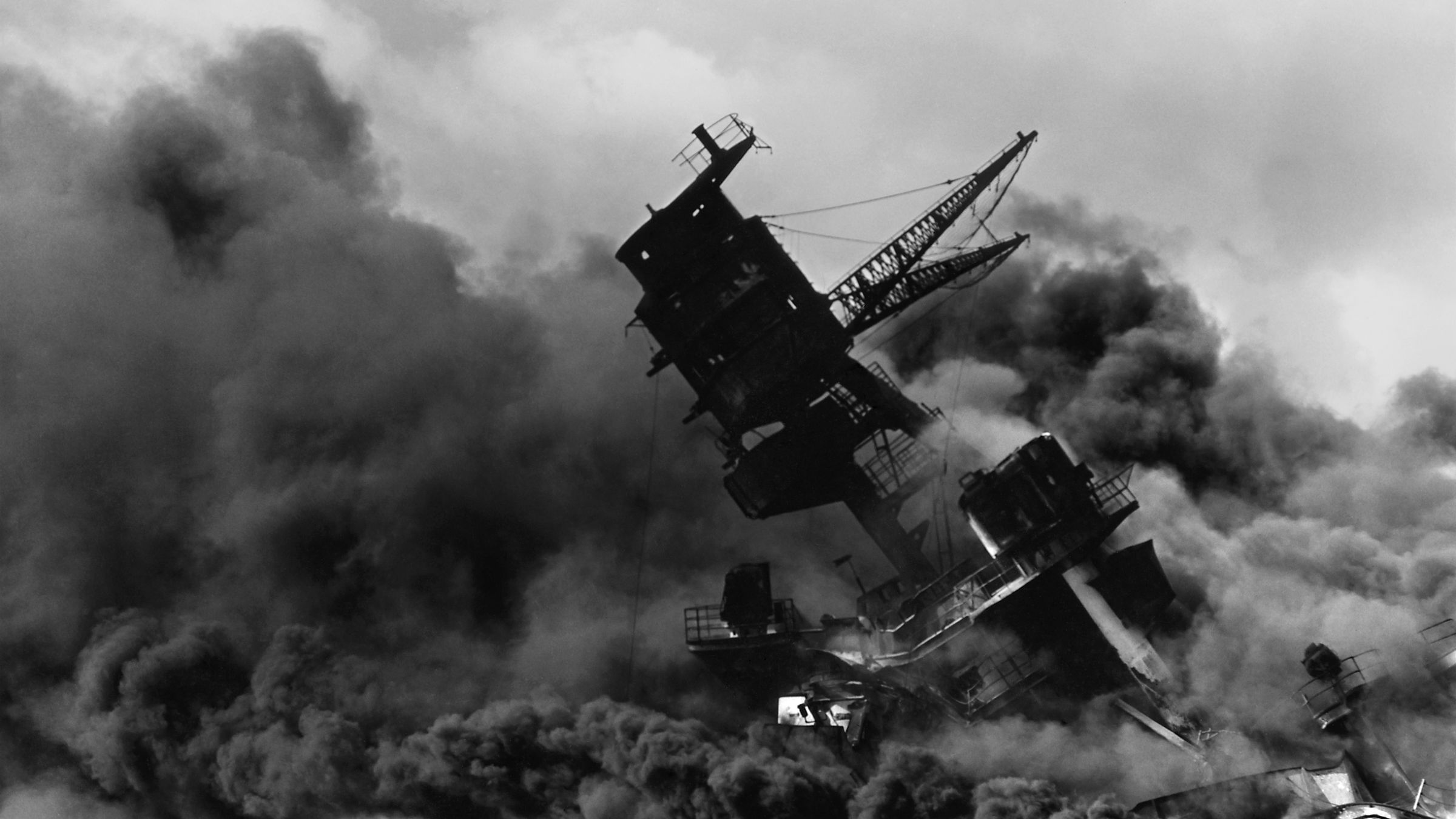 The USS Arizona burning after the Japanese attack on Pearl Harbor, December 7, 1941.