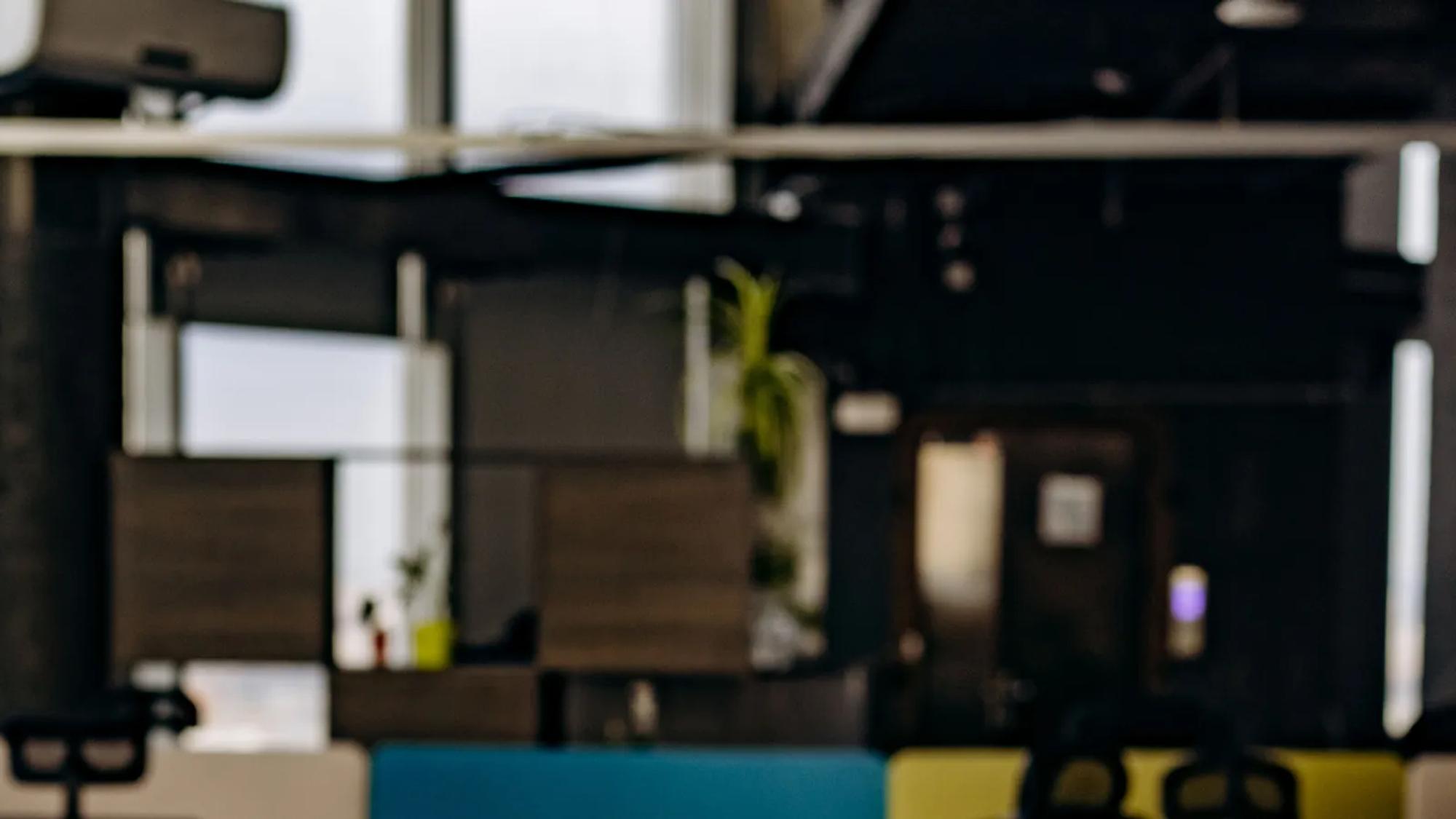 A single monitor on an office desk, the surface where a CRM scoring model either has enough labeled history behind it or does not