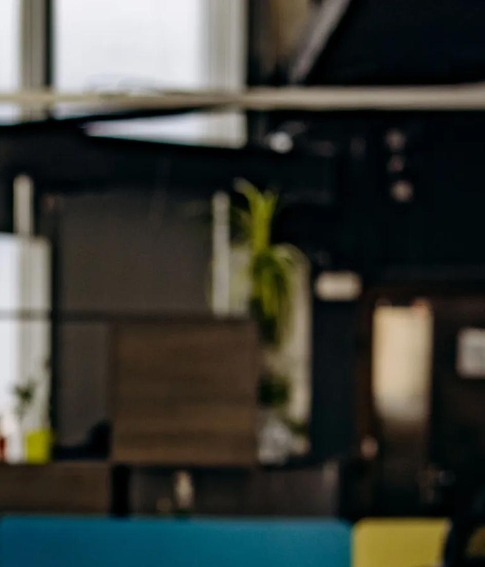 A single monitor on an office desk, the surface where a CRM scoring model either has enough labeled history behind it or does not