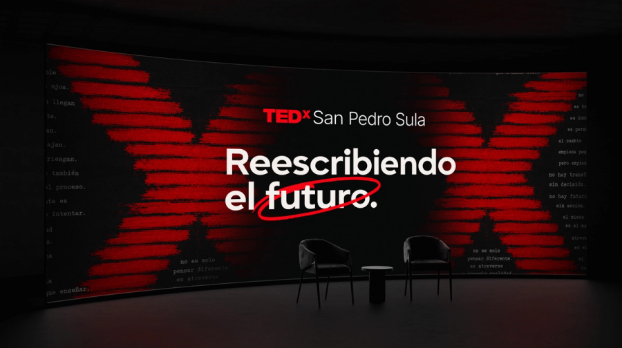 Stage backdrop screen carrying the TEDxSanPedroSula identity
