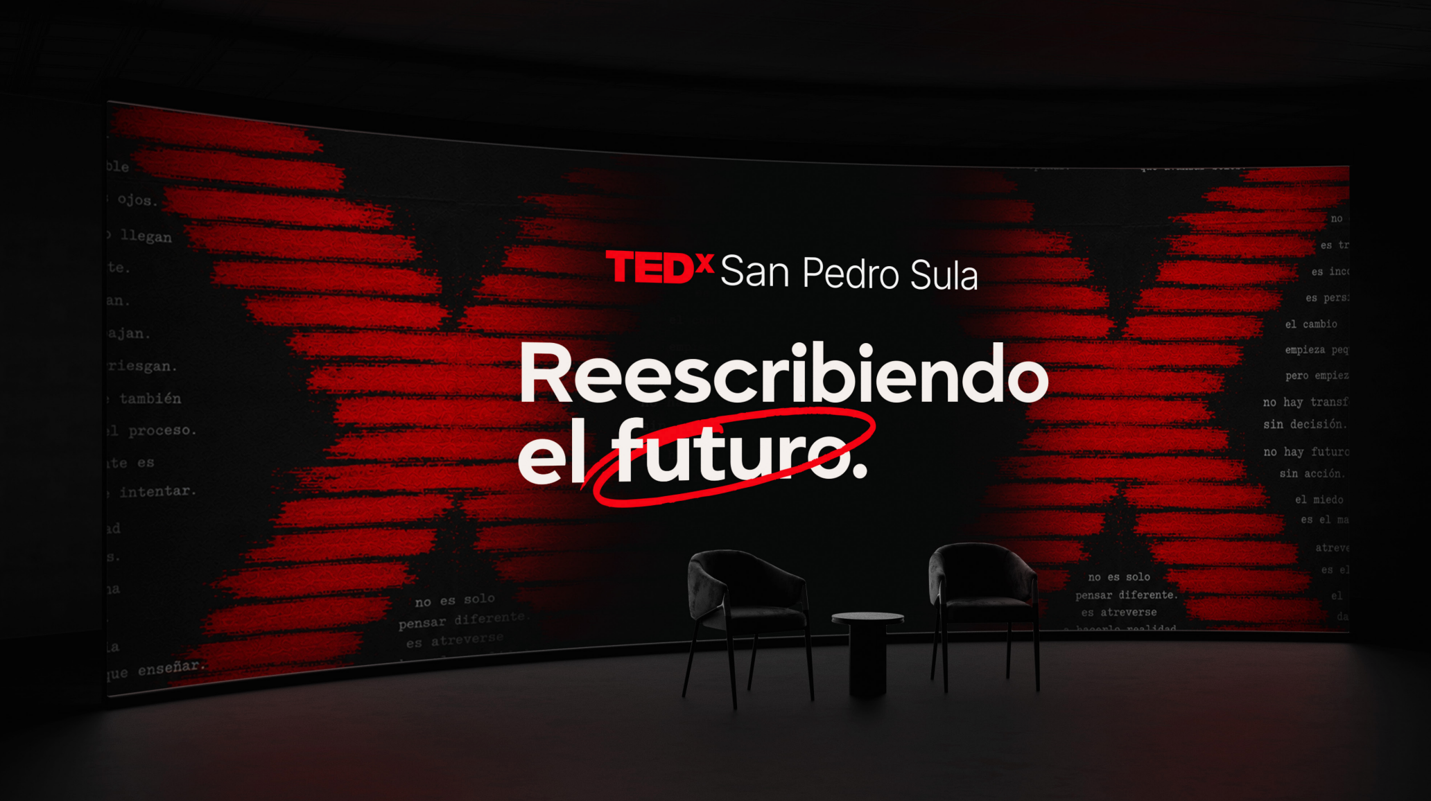 Stage backdrop screen carrying the TEDxSanPedroSula identity