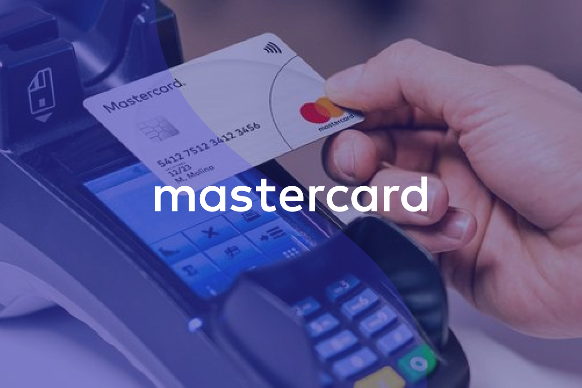 A hand paying something with a credit card, with blue transparent overlay and the Mastercard logo over it