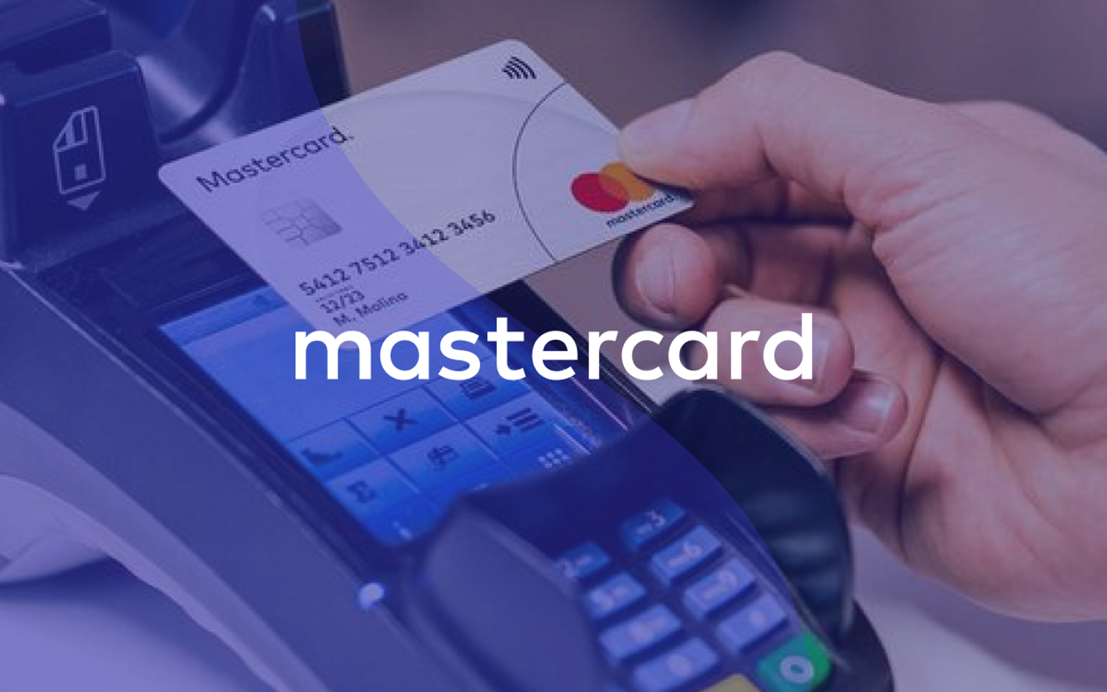 A hand paying something with a credit card, with blue transparent overlay and the Mastercard logo over it