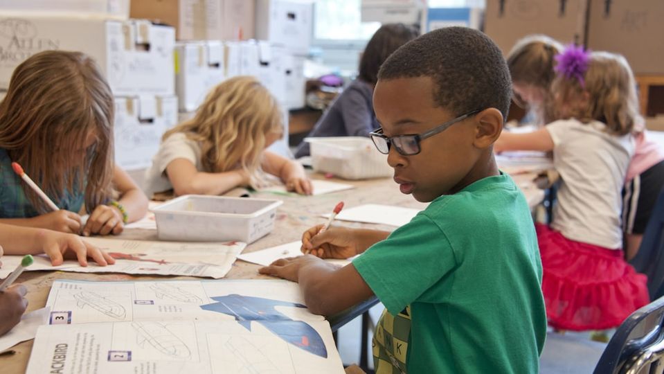 Group of children learning math concepts through various personalized approaches