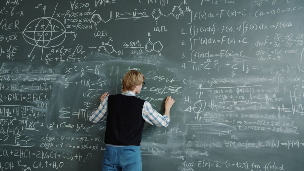 Middle school student solving algebra problems with visual learning tools and math worksheets on desk