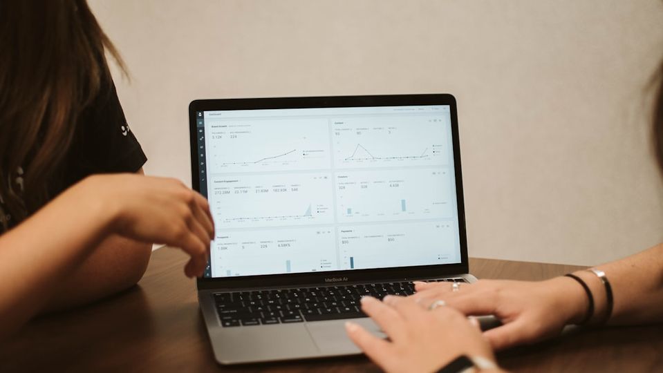 Child engaged while working on math problems on a laptop, demonstrating personalized online learning