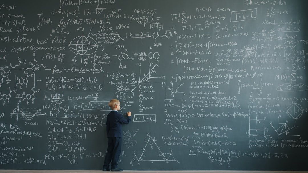 Happy child solving math problems with visual manipulatives and mathematical thinking tools on desk