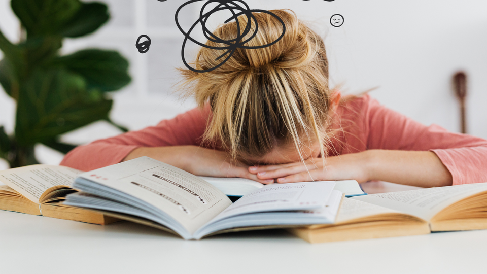Girl with math anxiety trying to do math homework.