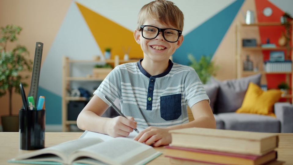 Happy student studying math with confidence and a smile