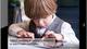 Boy solving math on a tablet