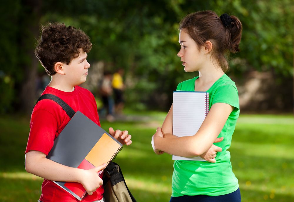 Two children talk after school