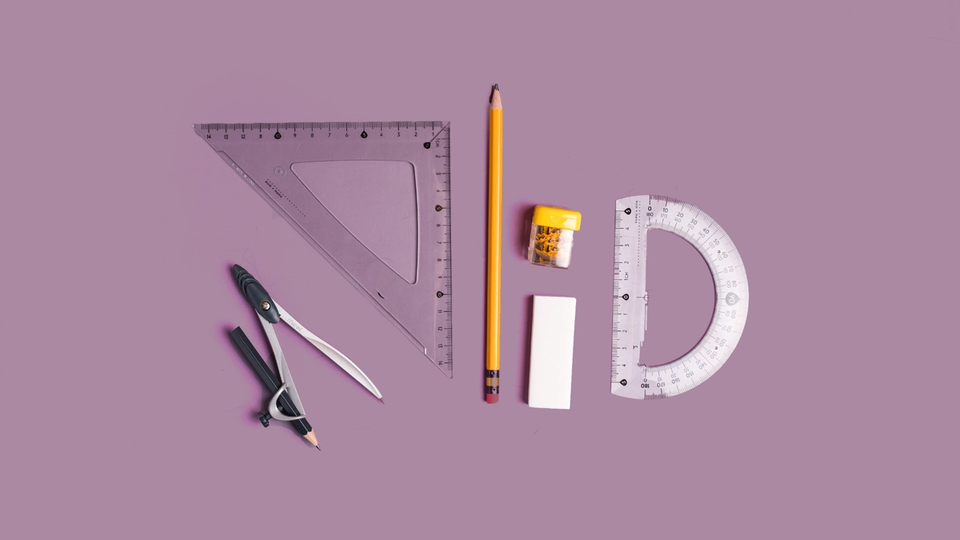 A set of essential geometry tools, including a protractor and compass, used to help students solve math problems effectively.
