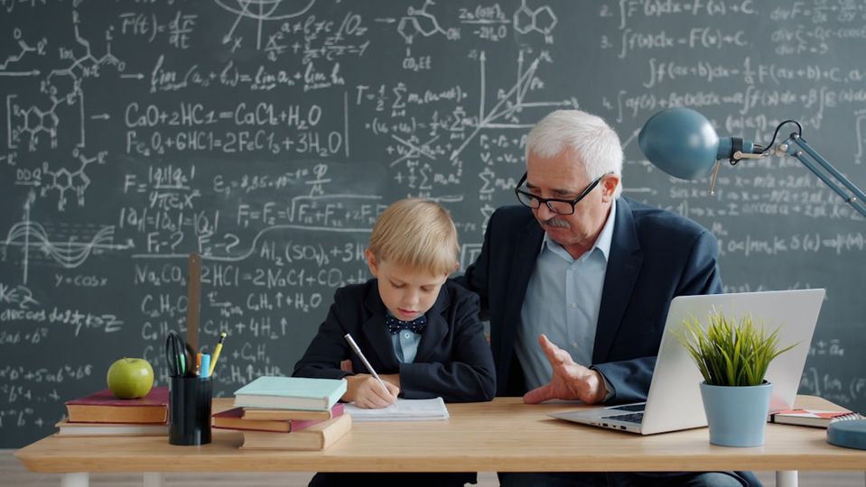 Certified tutor helping a student with math in a supportive one-on-one session