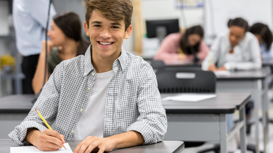 Teen Happy in the Classroom Learning