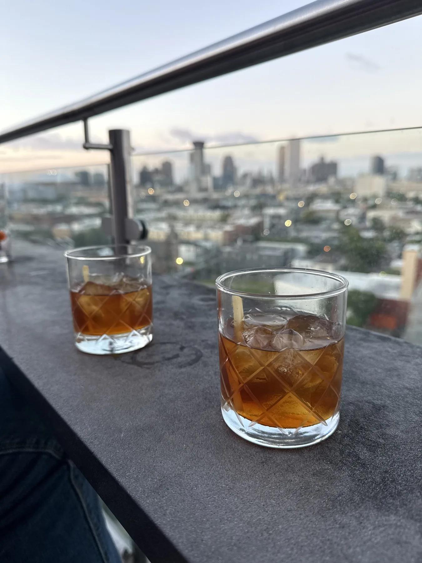 A deep amber Boulevardier with orange peel
