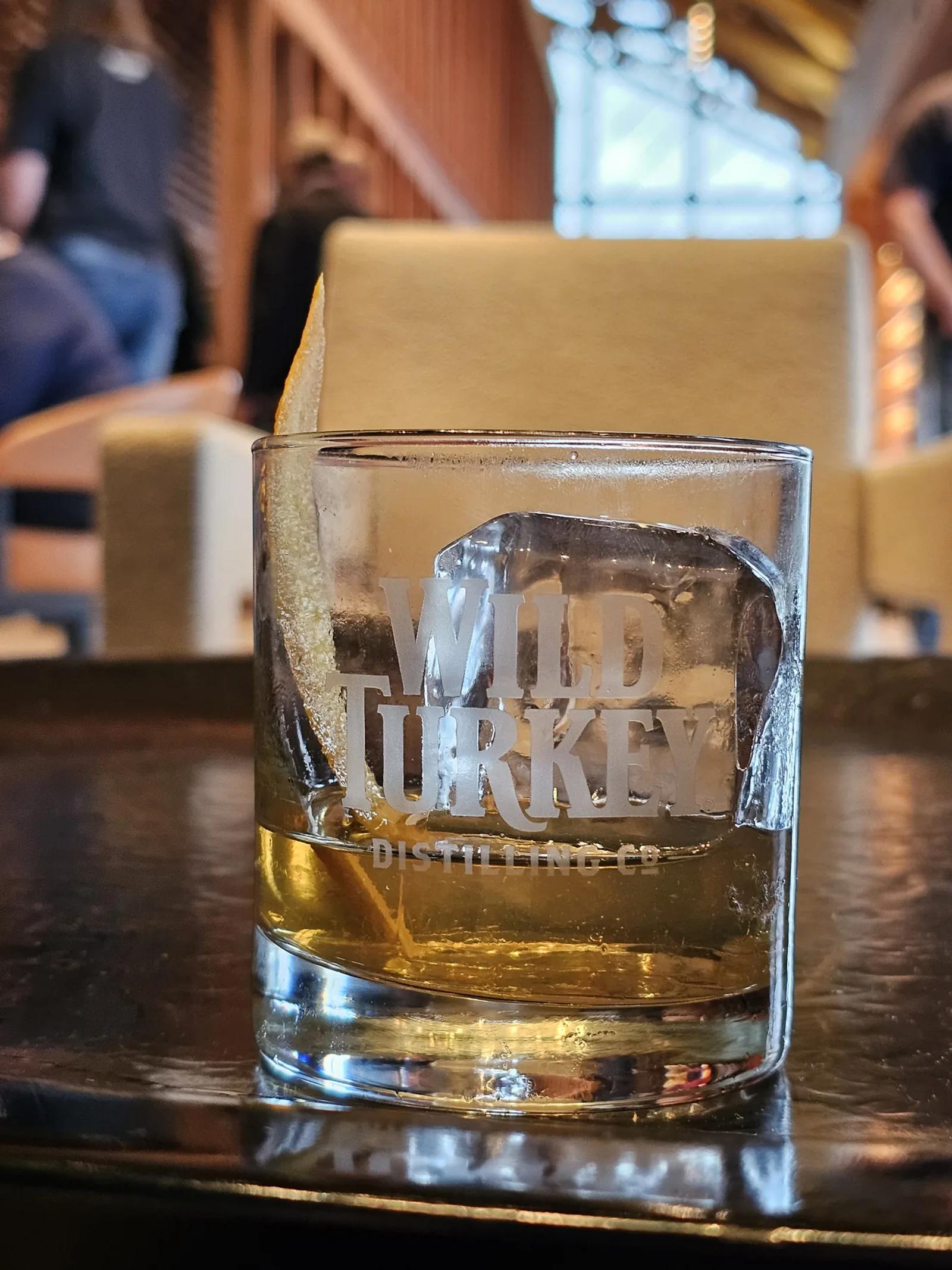 Whiskey tasting glasses paired with pieces of chocolate