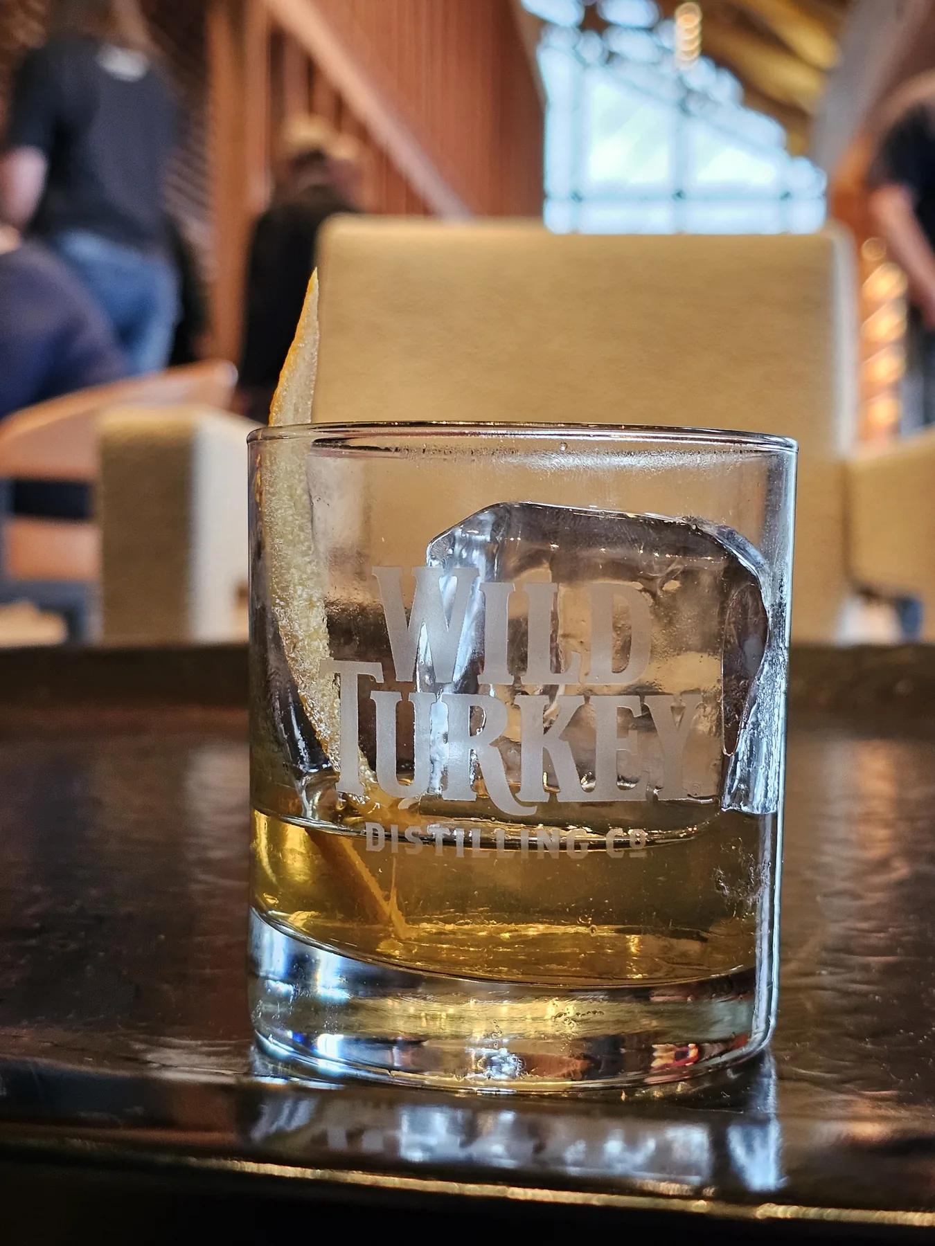Whiskey tasting glasses paired with pieces of chocolate