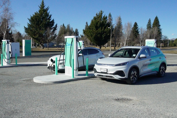 Image of the new EV chargers at Twizel, two Meridian fleet vehicles parked.