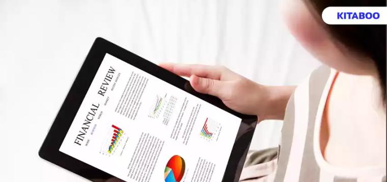 Top view of tablet with a financial review