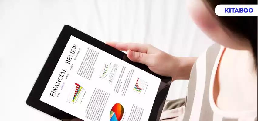 Top view of tablet with a financial review
