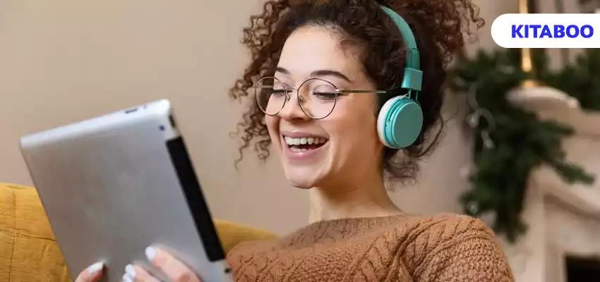 Medium shot smiley woman with headphones