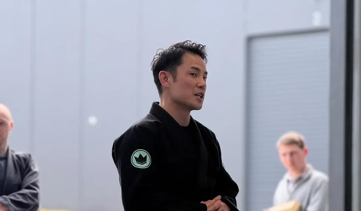 Jason Ng talking to the room on opening day at the Mitcham academy