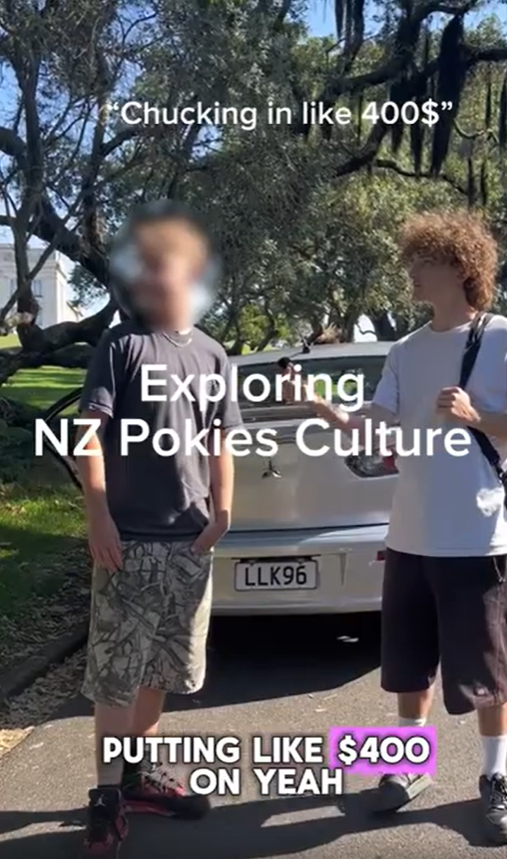 Two young men stand outdoors near a silver car. Overlay text reads "Chucking in like 400$", "Exploring NZ Pokies Culture", and "PUTTING LIKE $400 ON YEAH".