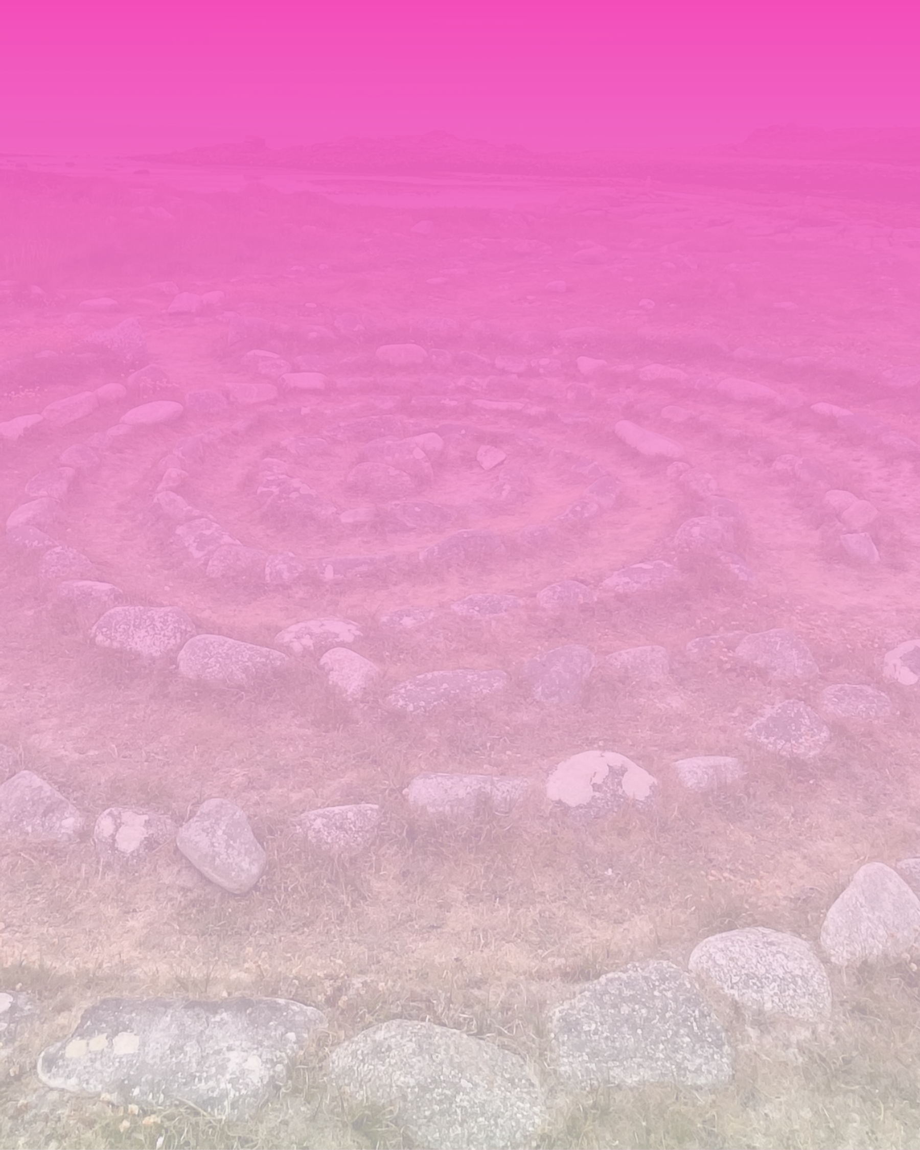A pink gradient over an image of rocks in a circle, in a grassy landscape.