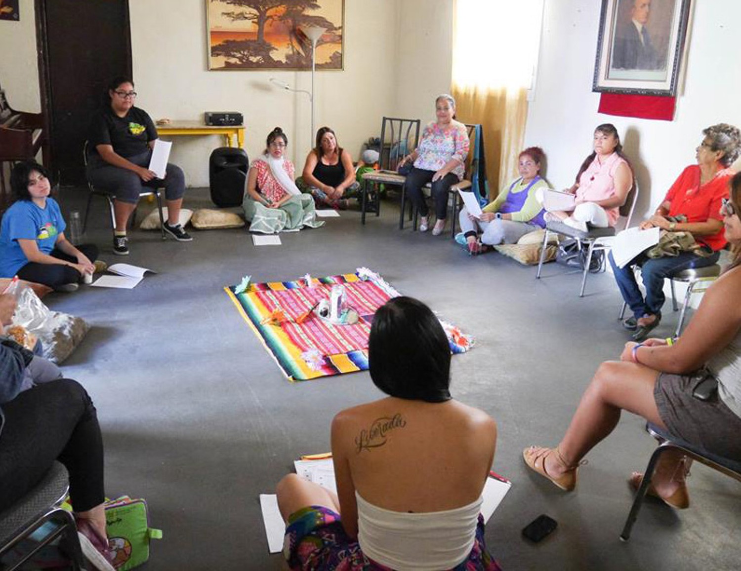 Círculo de Mujeres (Circle of Women), 2016. A half day workshop in which women came together to honor their bodies, lives, victories and struggles in a sacred circle. The event’s activities included sage blessings, visioning, joyful dancing and group discussions. Project concept developed as part of Activating Vacancy Arts Incubator in collaboration with buildingcommunityWORKSHOP. Image: Christina Patiño Houle.